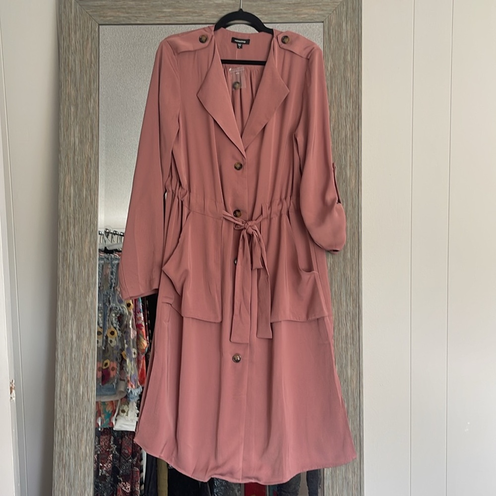 This is a great trenchcoat.  Wear it as a coat or a dress.